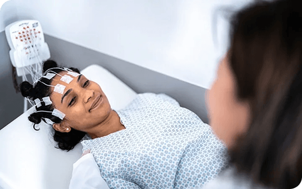 Patient receiving treatment at sleep disorders center
